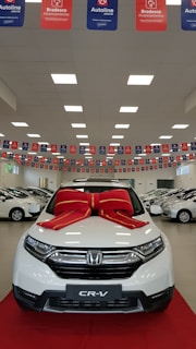 white Honda vehicle