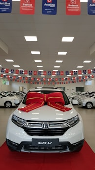 white Honda vehicle