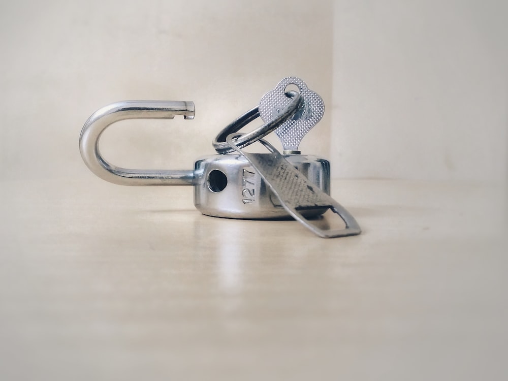 gray stainless steel padlock