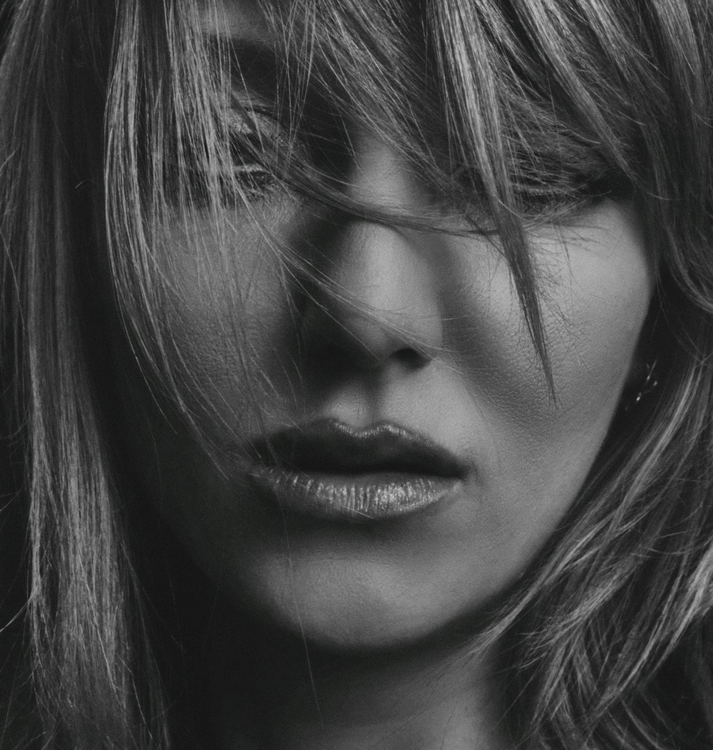 grayscale photography of woman's face