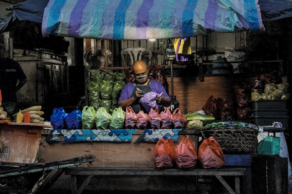 man in purple top