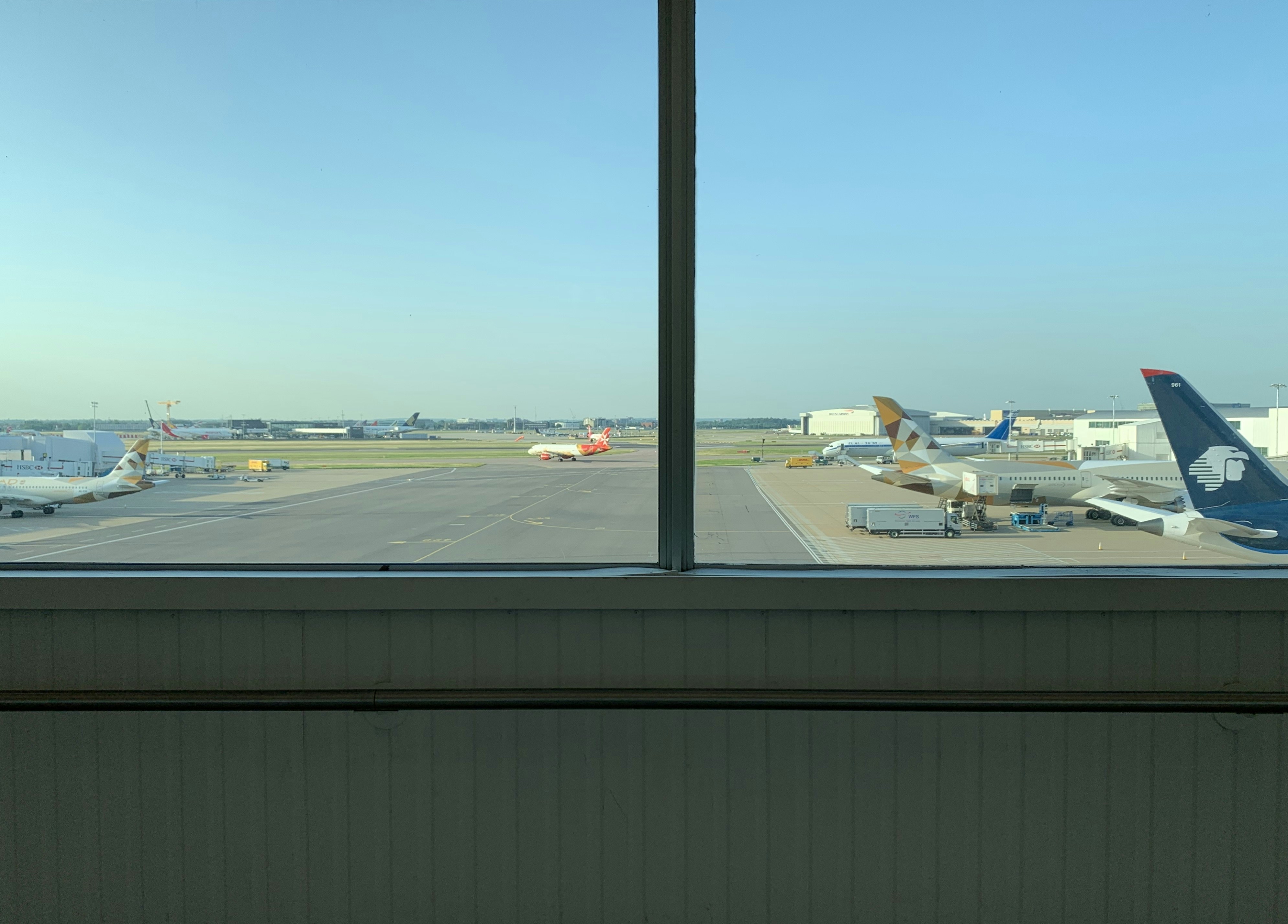 view of airplanes at an airport, 