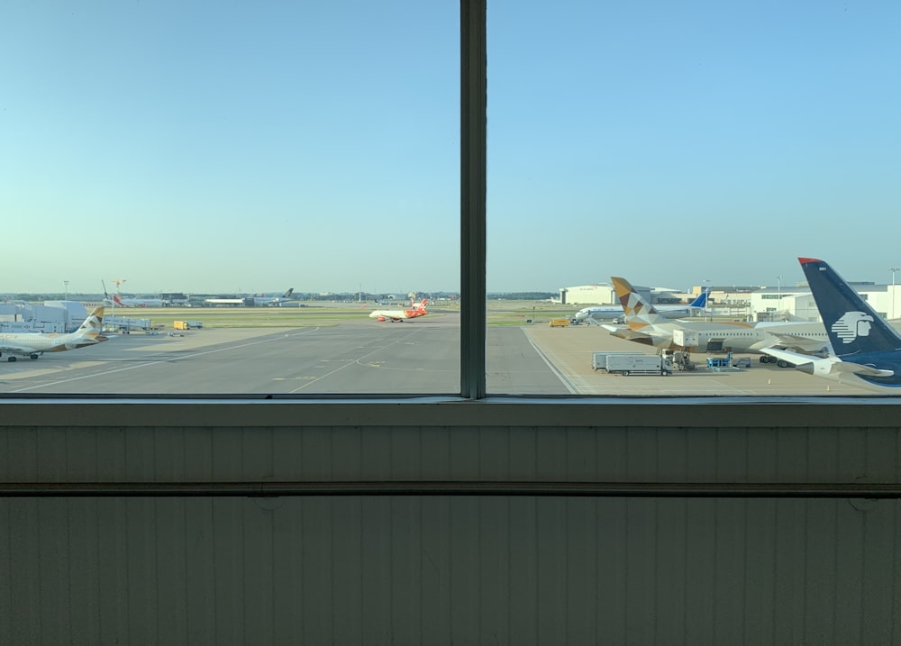 view of airplanes at an airport