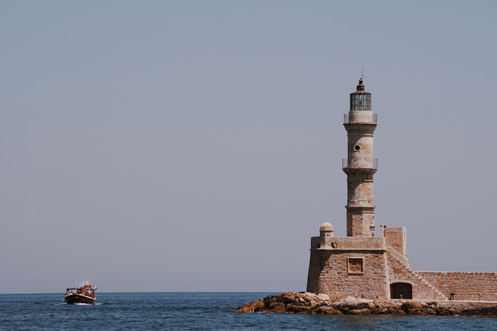 white and gray lighthouse at daytime