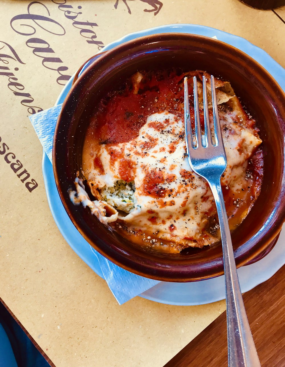 lasagna on maroon bowl