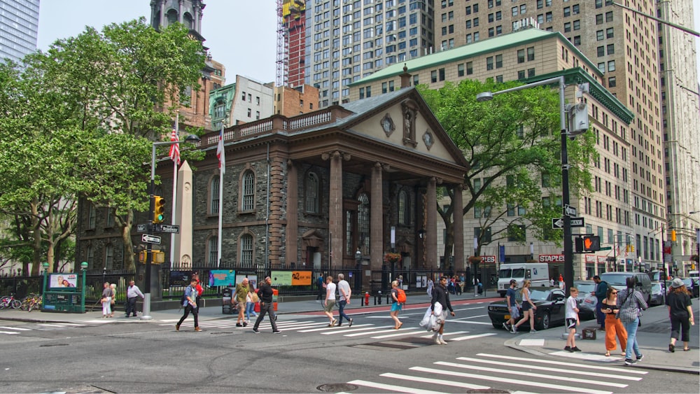 people walking in pedestrian lane