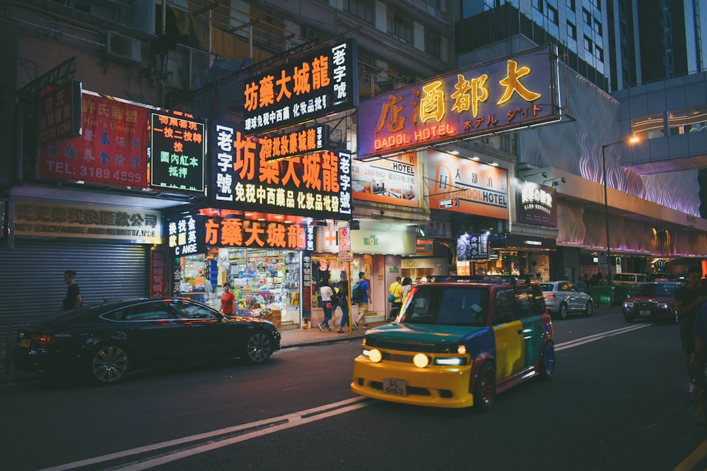 moving yellow and green car