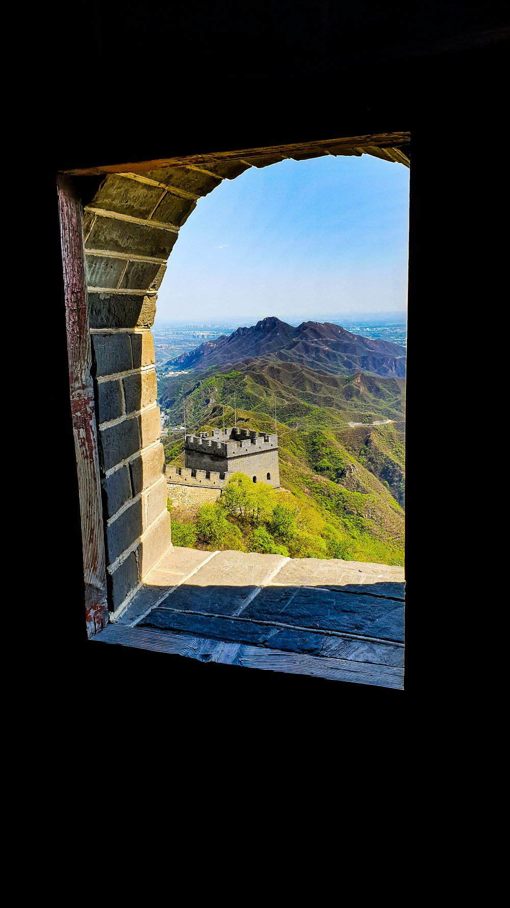 building near mountain during daytime