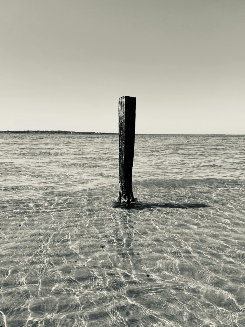 grayscale photography of wooden stand