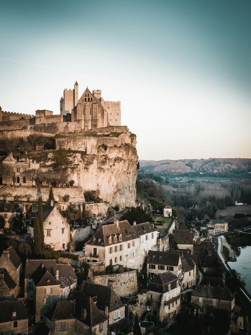 grey castle on rock mountain