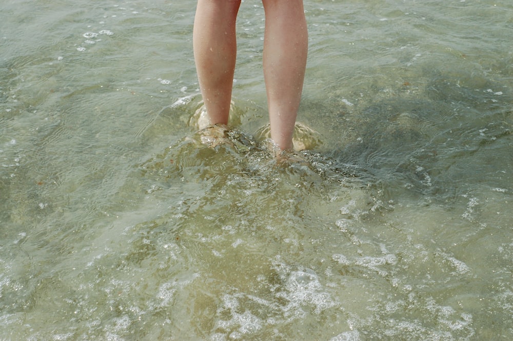 person standing on the seashore