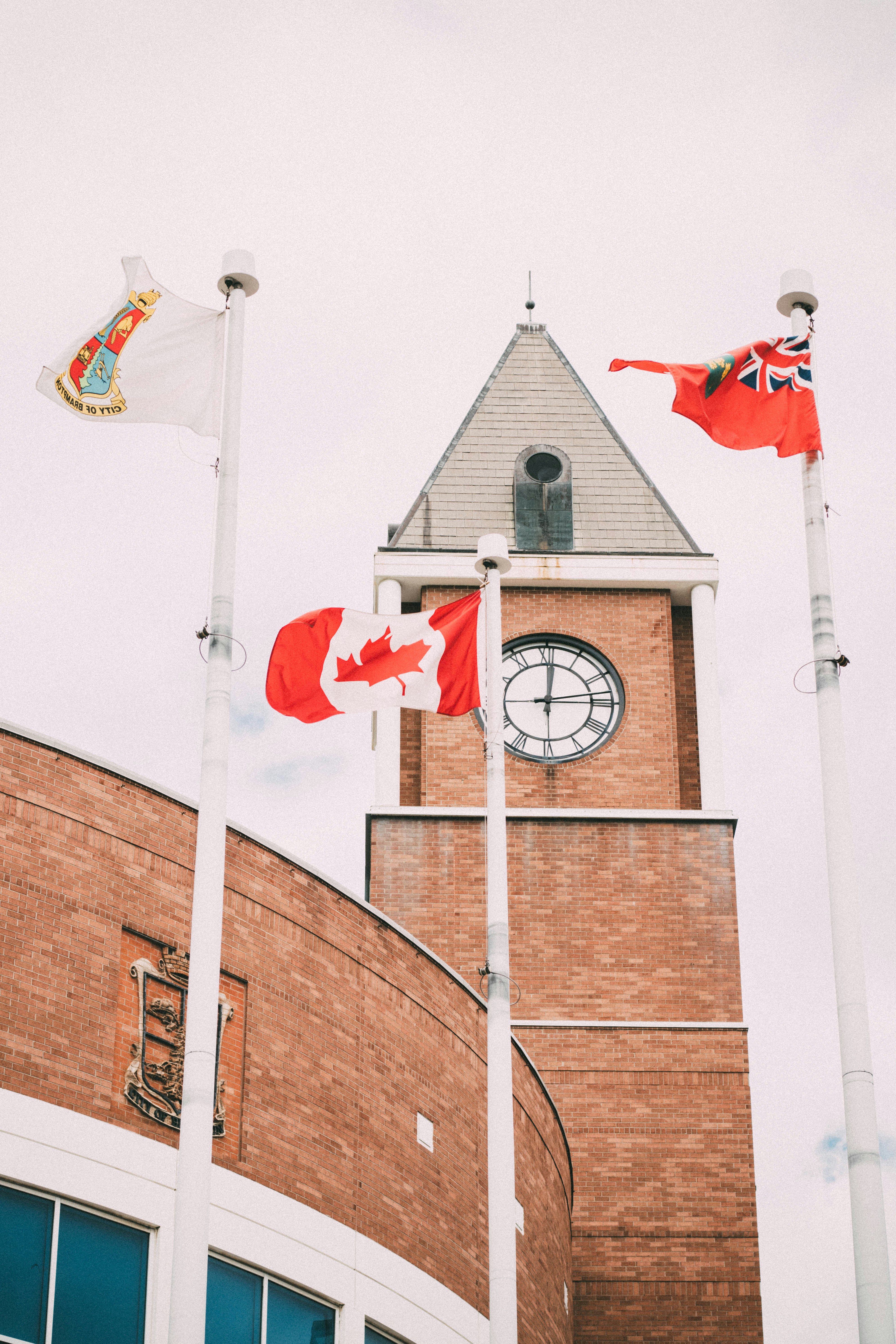 Canadian flag with immigration symbols