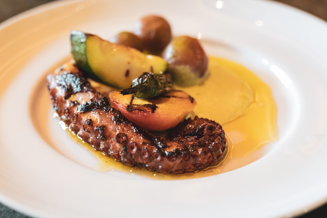 meat with vegetables on plate,