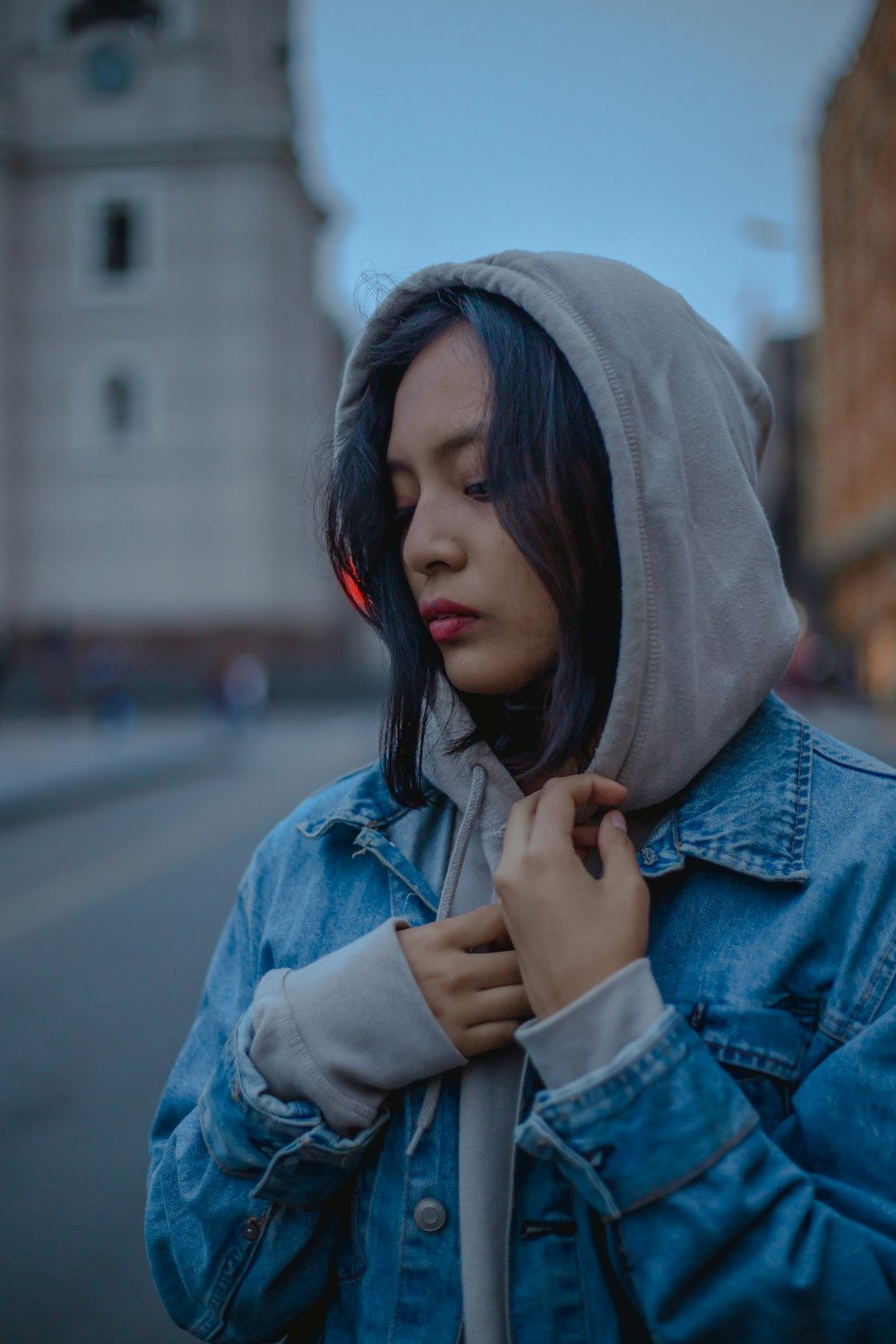 woman holding her jacket