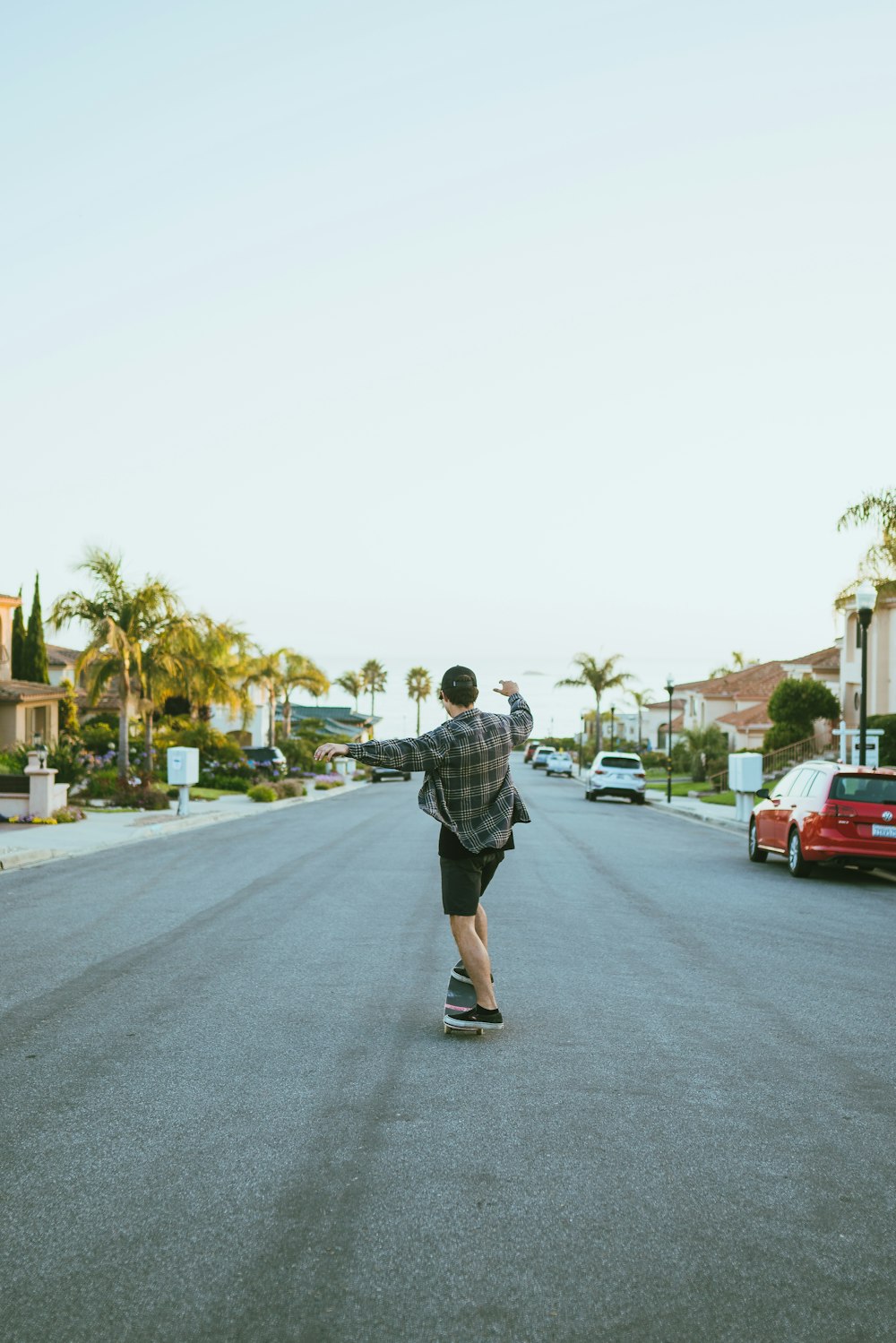 man riding skateboard during daytime