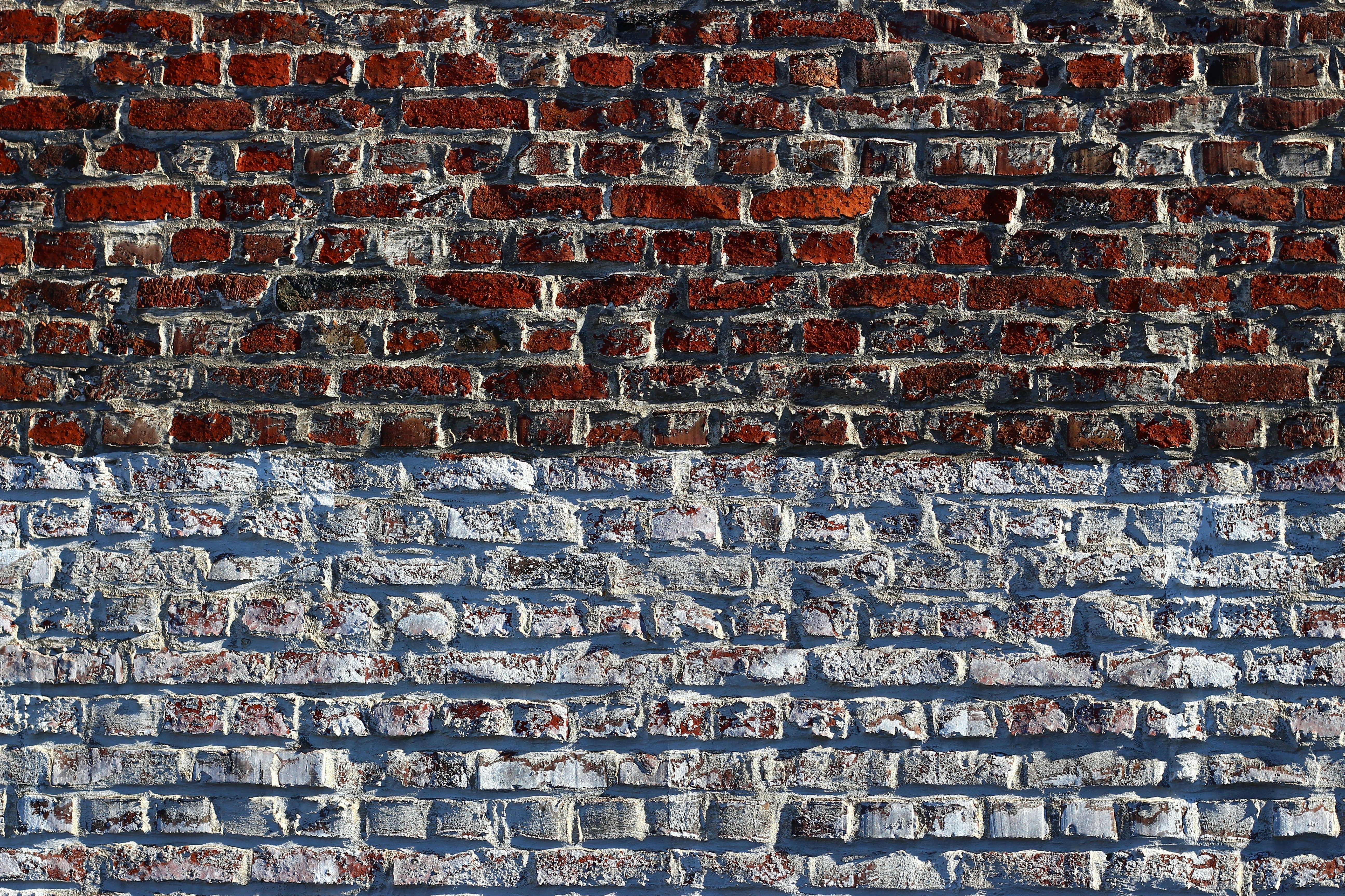 red and blue brick wall photo Free Aachen Image on Unsplash