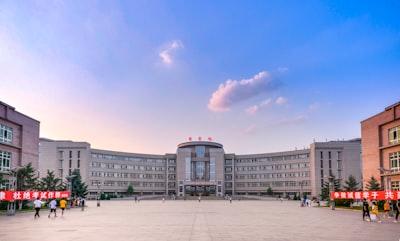 grey concrete building during daytime cupid google meet background