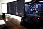 turned on flat screen monitors