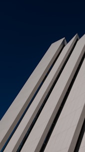 A panoramic view of a stunning architectural landmark against a clear blue sky.