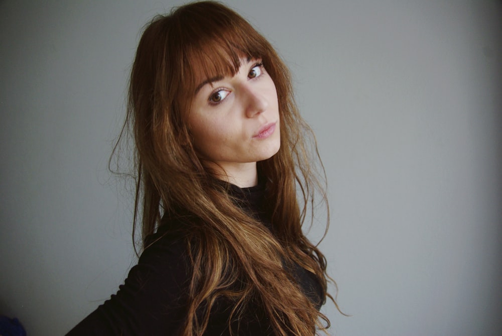 women wearing a black shirt close-up photography