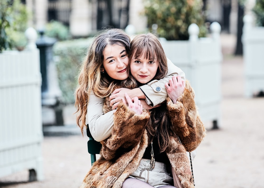 photo of 2 girls with blurry background