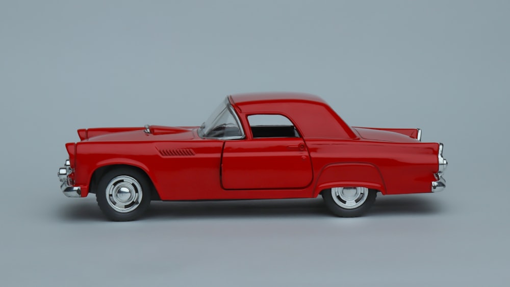 red coupe vehicle