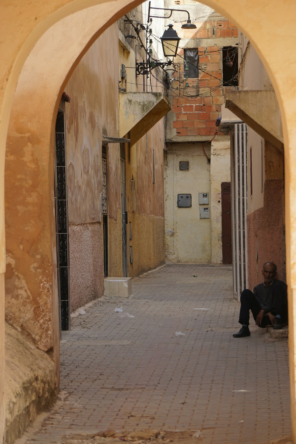 person seated near building