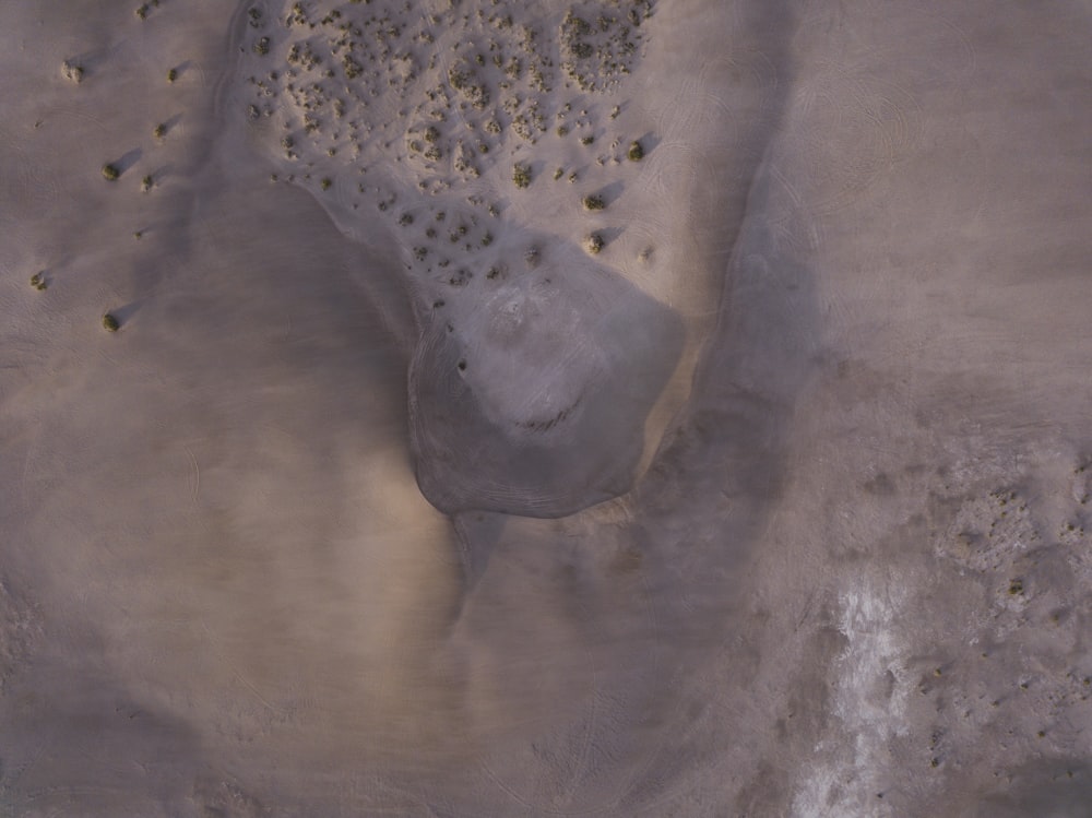 an aerial view of a snow covered area