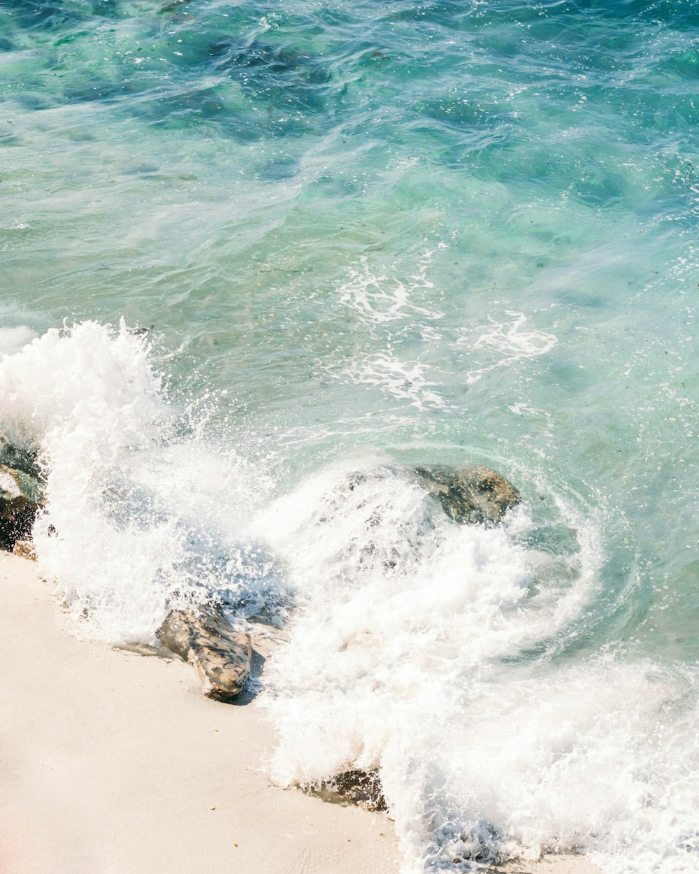 water waves on rock view