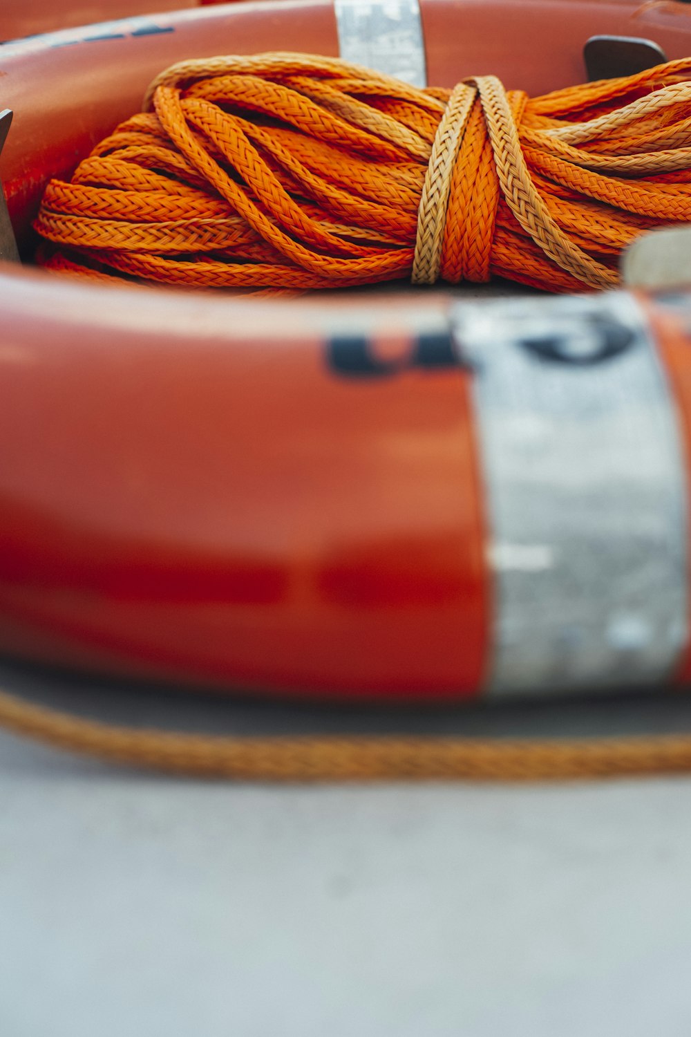 orange swim ring with rope