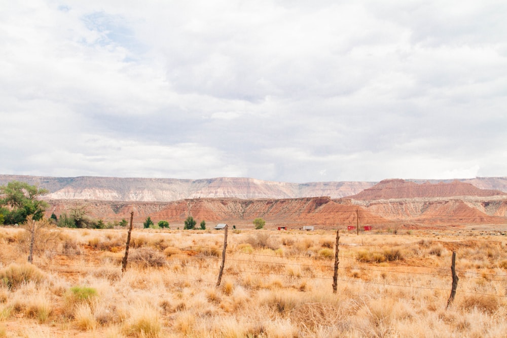 rock plateau under clouded sky