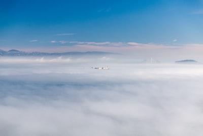 clouds during day gray wolf zoom background