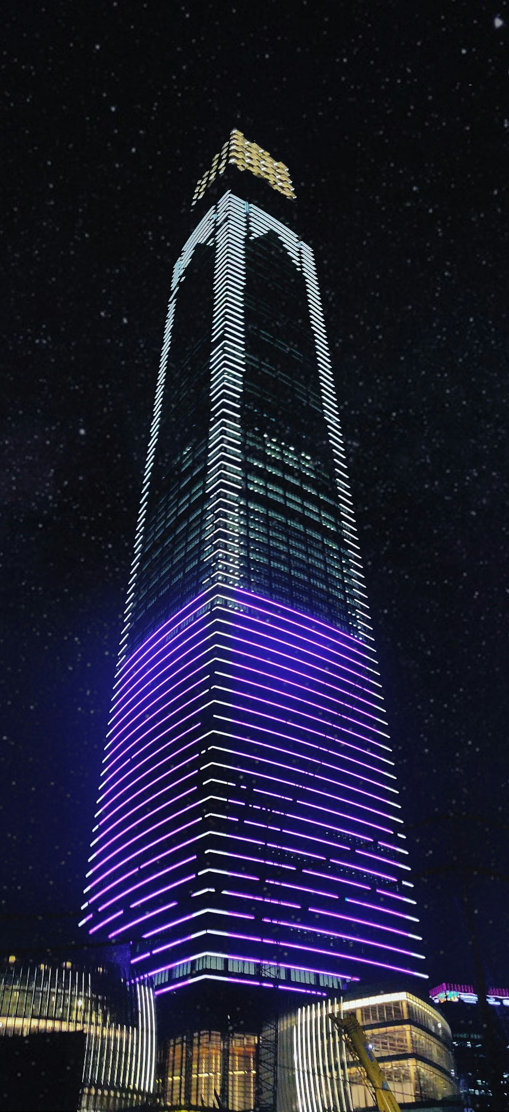 white and violet lit building