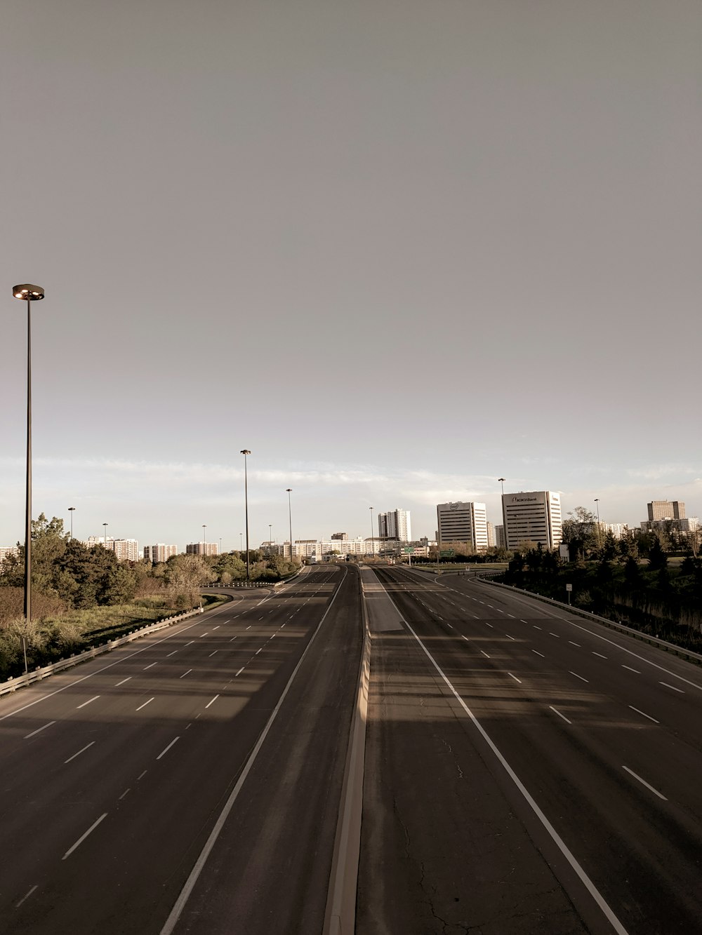 empty expressway under grey sky