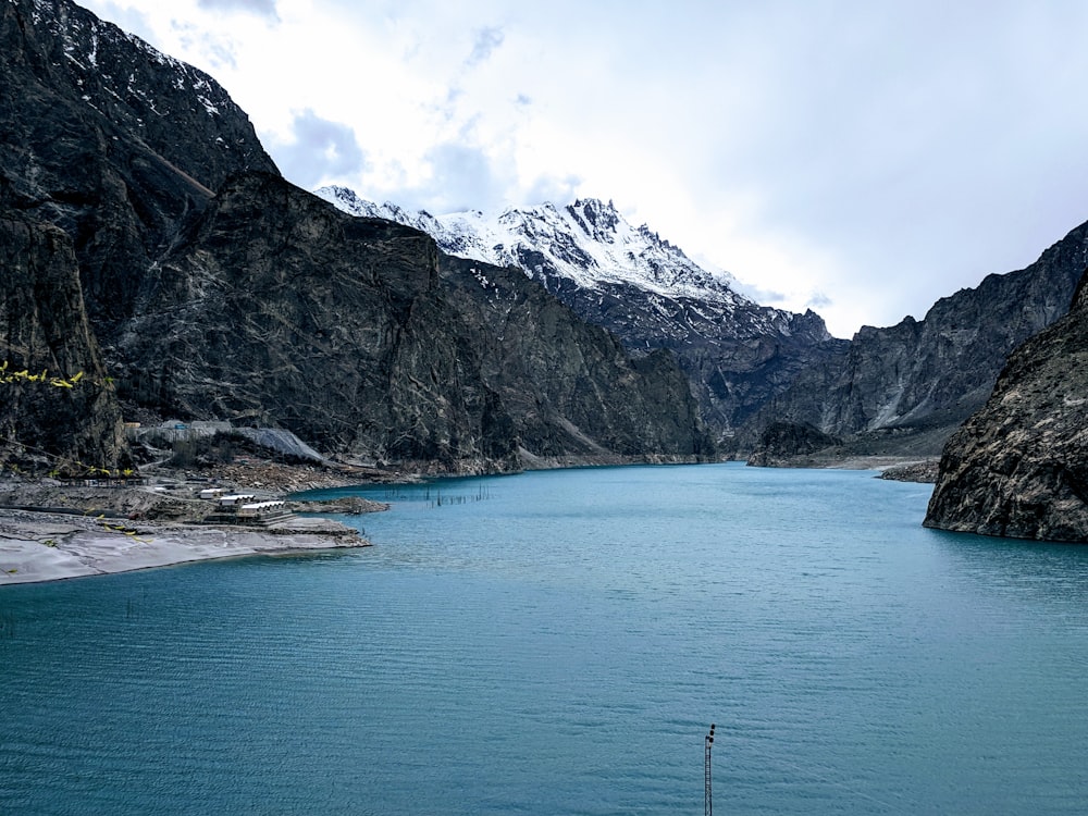 white snow capped mountain across river