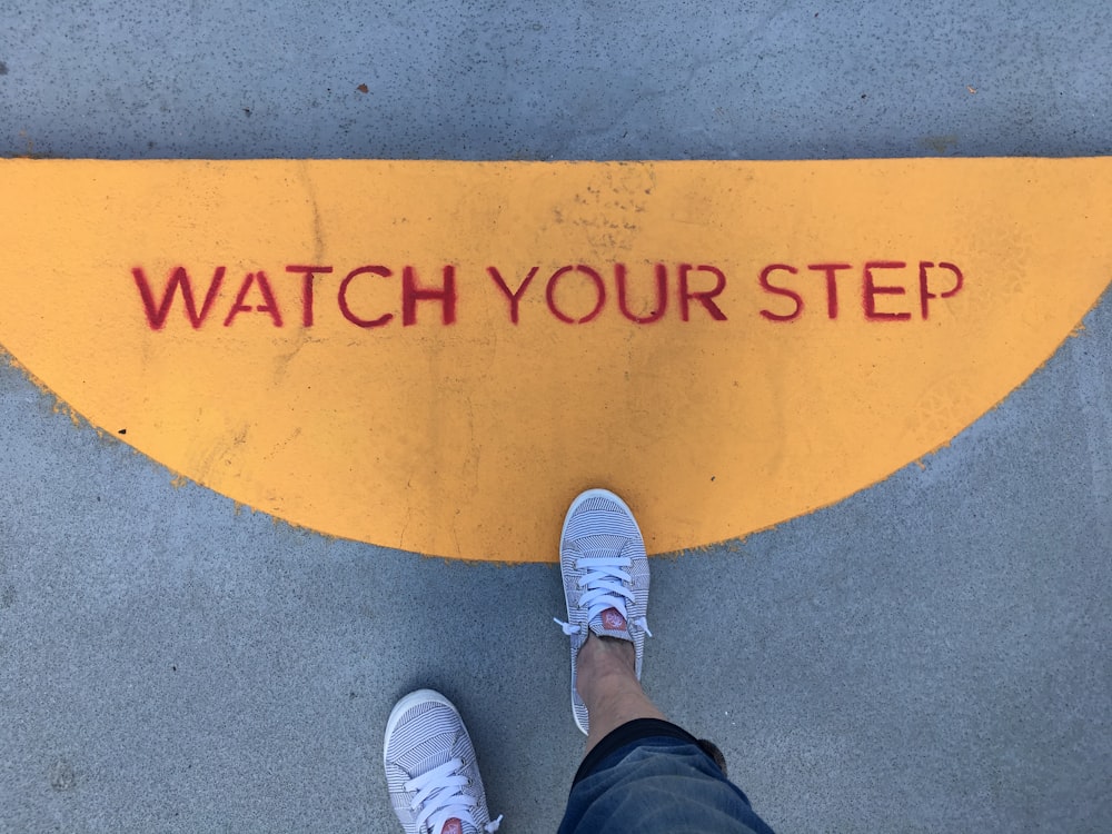 watch your step signage