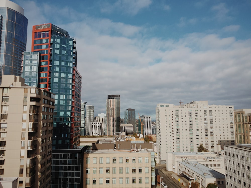 white and blue cloudy sky over the city