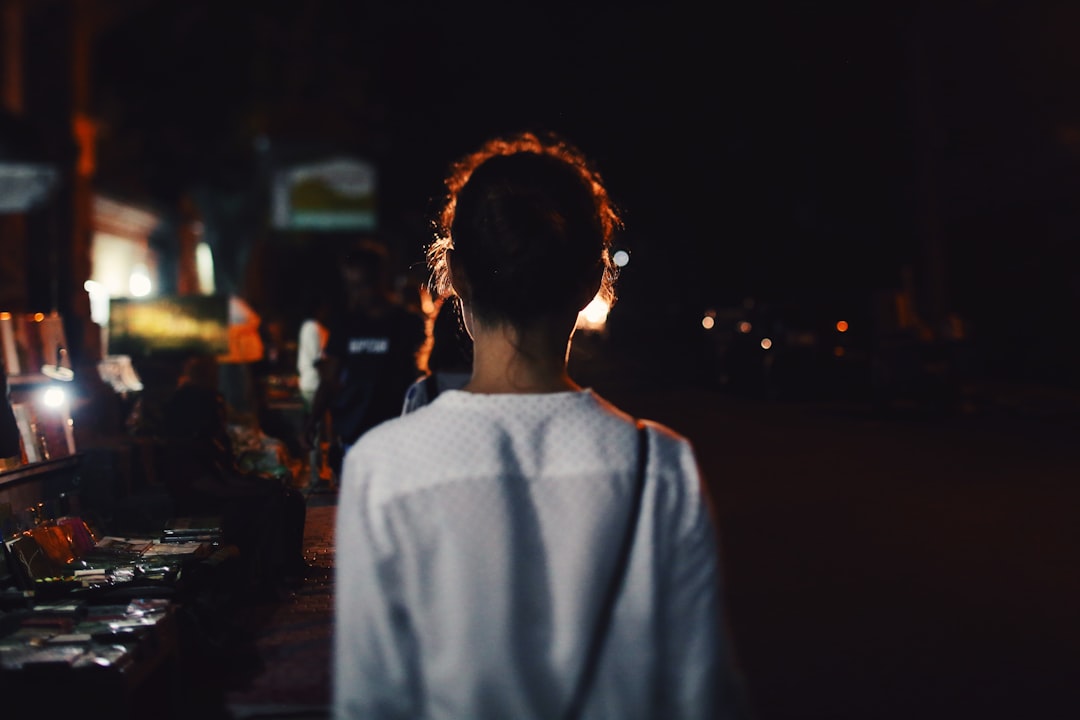 woman in white top