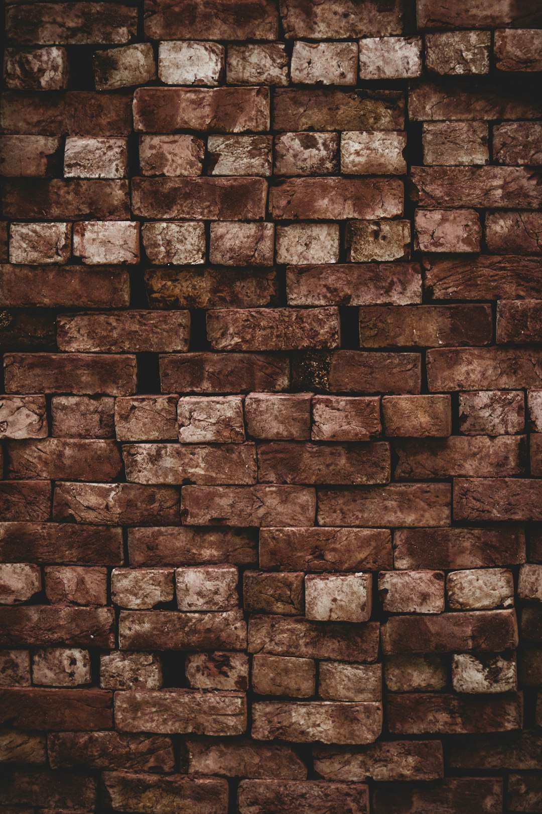 close photo of brown brick wall