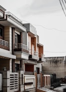 2-storey brown concrete building