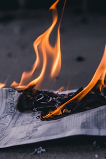paper burning on focus photography