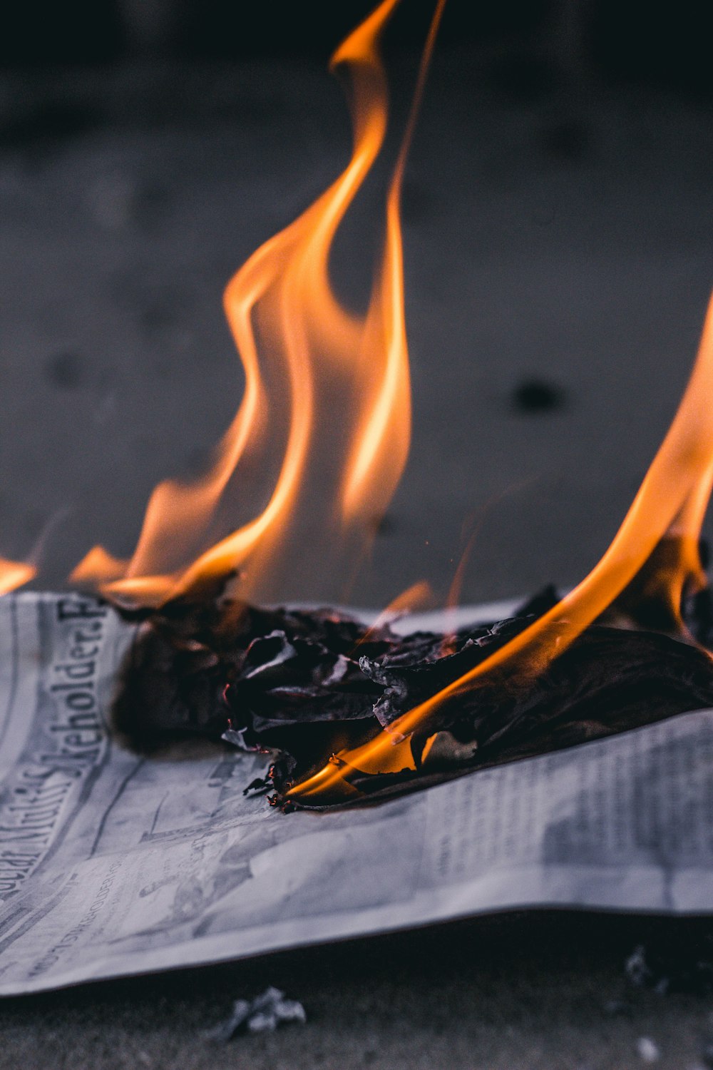 paper burning on focus photography