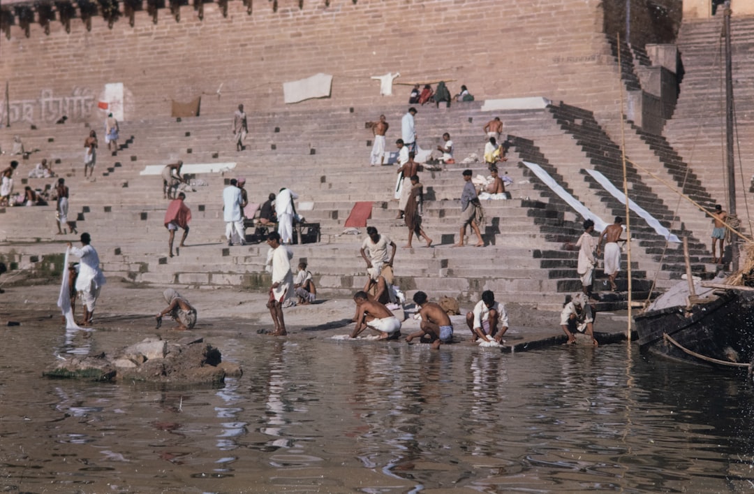 body of water with people taking bath