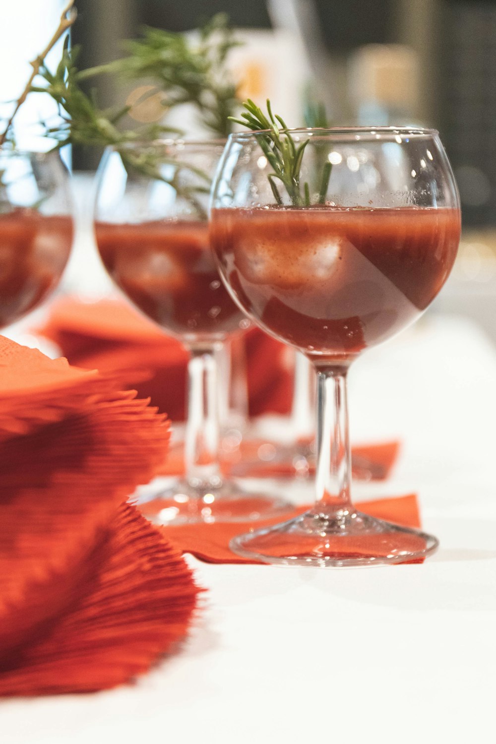 red liquor in wine glass
