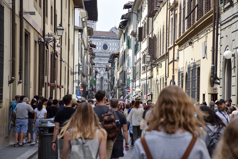 people walking on building alley