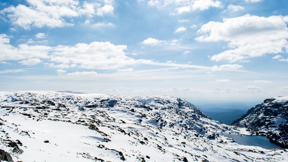 snow covered mountain during daytime