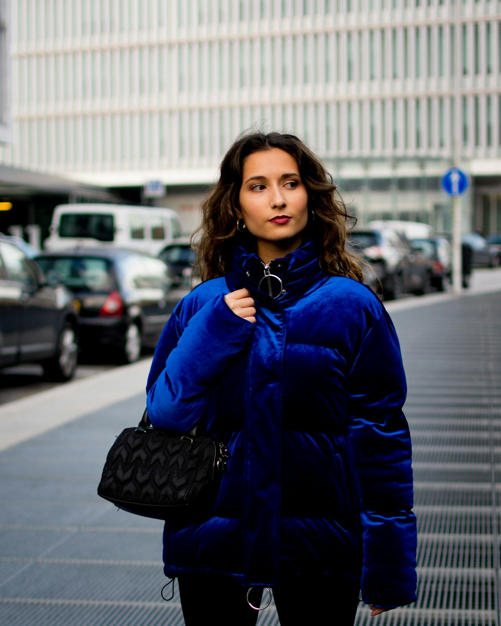 woman's blue velvet jacket