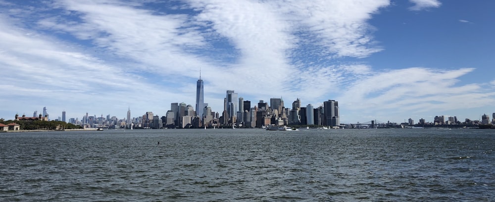 concrete buildings beside sea