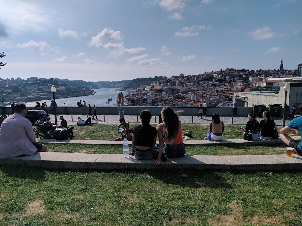 people sitting on bench at day