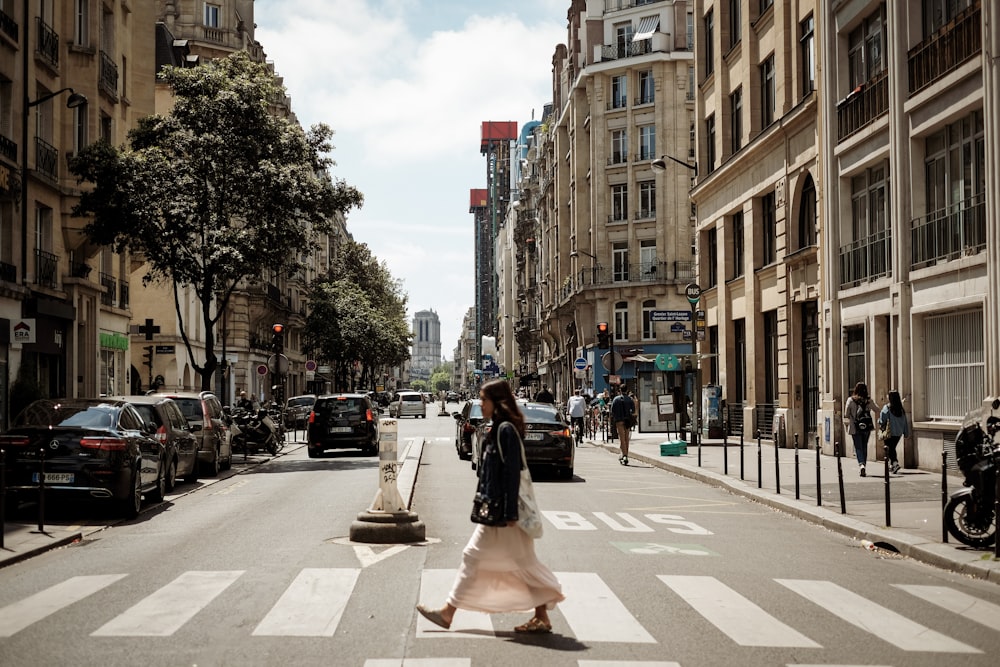 woman walking near street during daytime